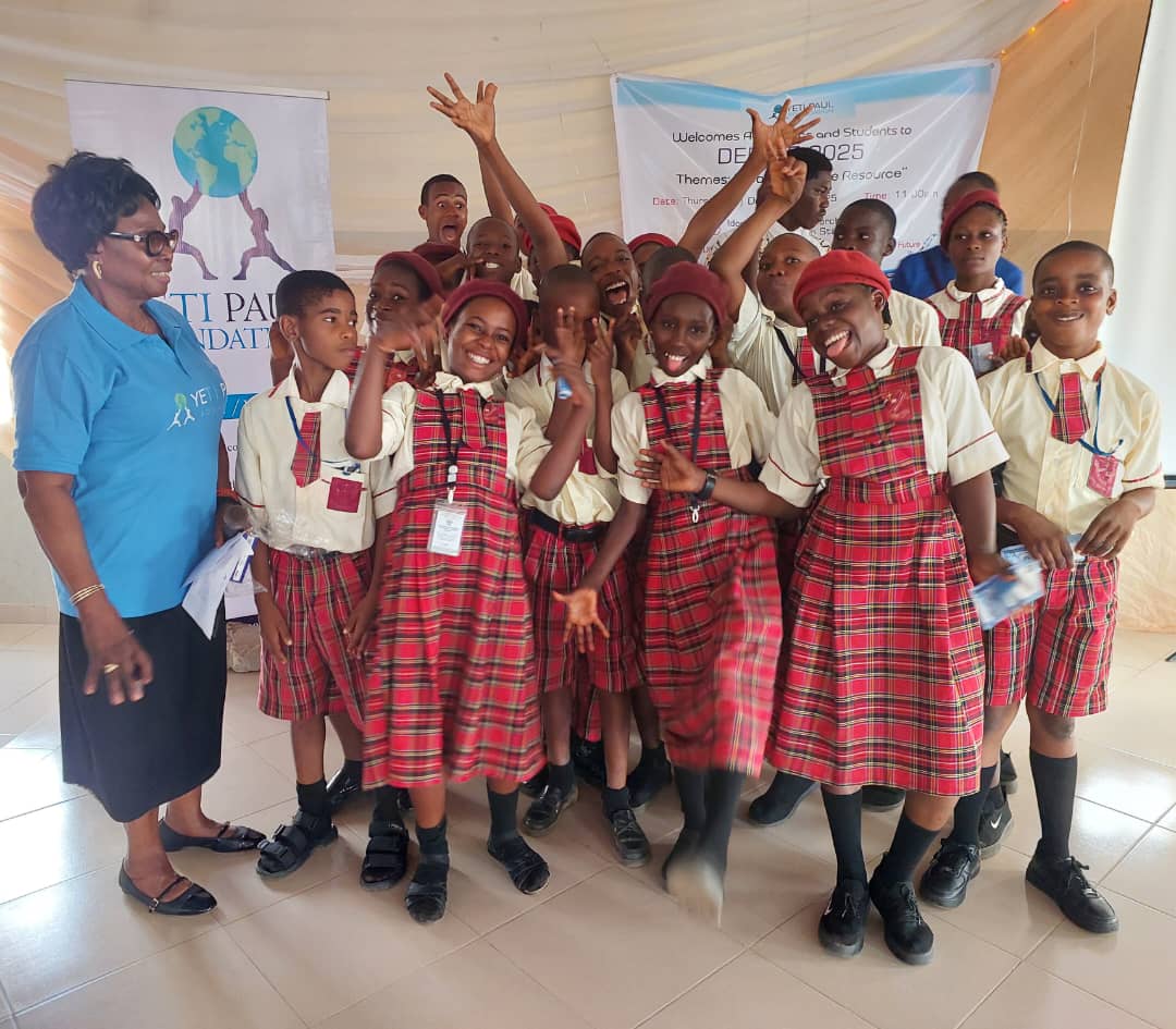 Students and Foundation team at education event